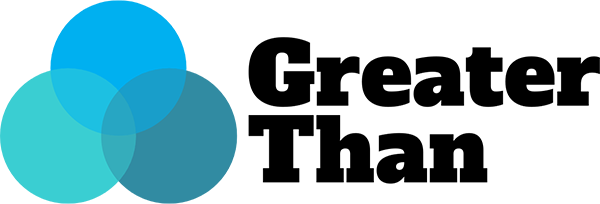 Three overlapping blue and teal circles forming a simple abstract icon on a black background.